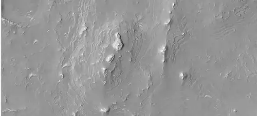 Layers in a butte in Arabia, as seen by HiRISE under HiWish program.