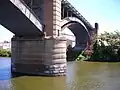 Bridge supports from the river.