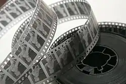 A reel of 35&nbsp;mm black & white movie film negative stock