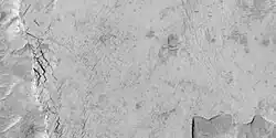 Close-up of blocks being formed, as seen by HiRISE under HiWish program as seen by HiRISE under HiWish program. Many long fractures are visible on the surface.