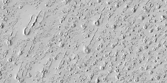 Close view of rootless cones with tails that suggest lava was moving toward the Southwest over ice-rich ground, as seen by HiRISE under HiWish program