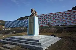 Bust of Lenin (Inscription in the background — Communism is our goal)