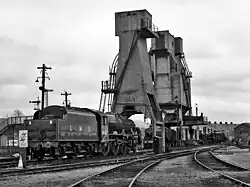 LMS 4-6-0 5690 LEANDER at Carnforth in the UK under the mechanical coaling tower.