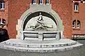 Wall fountain on the facade