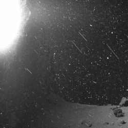 A black-and-white short animation of dust on the surface