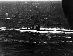 A black and white image of the U-642 submarine surfaced.
