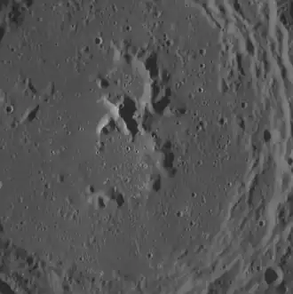 Close-up of the central peak complex, showing hollows