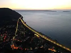 A55 Expressway bypasses the older road through Penmaenmawr town centre before resuming the original route around the headland.