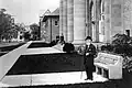 c. about 1915 - Standing near his statue on the Cornell campus