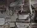 Commander's fighting position; note hatch for ejecting spent casings