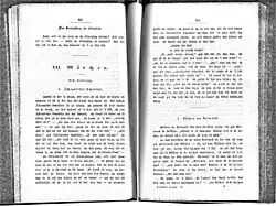 An open book with serif font