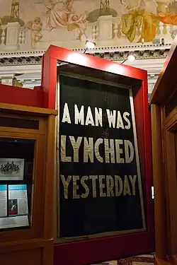 Image 2"A Man Was Lynched Yesterday" flag, hanging at the Library of Congress (from Civil rights movement (1896–1954))