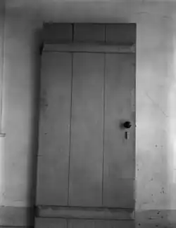 A batten door-the battens are the horizontal pieces which hold the door together.