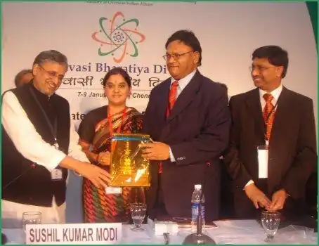 The late Mr A Rajbansi receiving the Lifetime Achievement Award from the India International Friendship Society in New Delhi (2008).