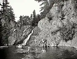 A group of children swim nude in Duluth, Minnesota in 1904