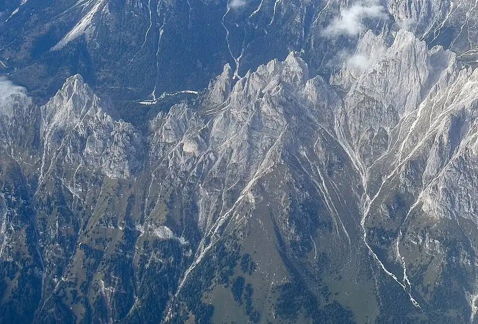 Cima d'Oltro (left) viewed from airliner., (Sass d'Ortiga in upper right).