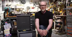 Adam Savage in a workshop.