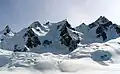 Austerity Mountain to right, with Adamant Mountain centered and The Stickle at far left