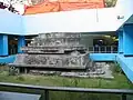 An Aztec sculpture of Ehecatl unearthed in 1967 during the construction of the Metro, which remains in the center of the Metro Pino Suárez station]