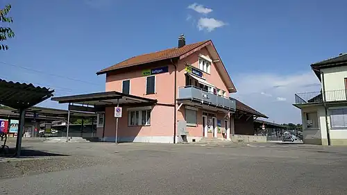 Two-story building with gabled roof