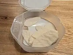 A 1 mm thin leaf shaped absorbent paper impregnated with nicotine