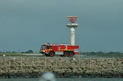 An Airservices Australia fire appliance travelling beside the runway at Sydney Airport on 5 January 2008