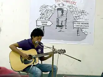 Akhu performing at the release of his first album, in 2009.