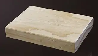 Specimen of acetylated wood (Accoya) resulting from the acetylation reaction of wood and acetic anhydride represents a novel development following decades of research.[23][24]