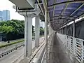 The footbridge to the BRT station that follows the underpass, 2022
