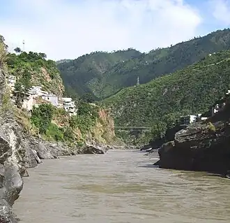 The sediment-laden Alaknanda river flowing into Devprayag.