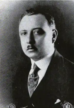 A black-and-white photograph of Alberto Gómez Zarate