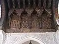 Details of the wood-carved canopy above the entrance