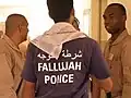 2nd Battalion 6th Marines Team 2 work with Fallujah Police to secure the first precinct.