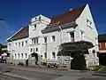 The Gemeindeamt of Altenberg bei Linz&nbsp;[de] at Reichenauer Straße 4, built by Mauriz Balzarek&nbsp;[de] from 1927 to 1930.