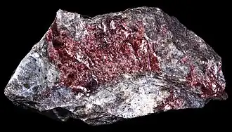 Alurgite, a red-purple manganese-rich variety of muscovite, from Italy