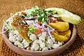 Hornado, slow roasted pork dish cooked in a marinade of beer, garlic, cumin and achiote