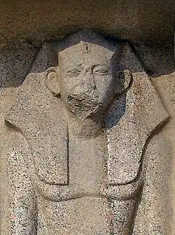 Statue of Amenemhat IV from the funerary temple of Amenemhat III at Hawara[dubious – discuss]