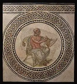 This is a mosaic from Johannisstraße, Trier dating to the early third century AD, showing the Pre-Socratic Greek philosopher Anaximander of Miletus holding a sundial.