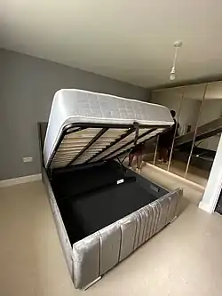 An ottoman storage bed