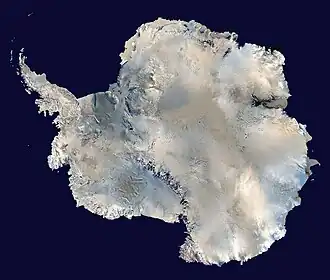 Image 6 Antarctica Photo credit: NASA Antarctica, the continent surrounding the Earth's South Pole, is the coldest place on Earth and is almost entirely covered by ice. Antarctica was discovered in late January 1820. Too cold and dry to support virtually any vascular plants, Antartica's flora presently consists of around 250 lichens, 100 mosses, 25-30 liverworts, and around 700 terrestrial and aquatic algal species. More selected pictures