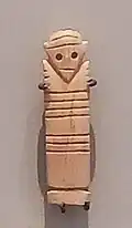 Anthropomorphic tag. Matmar grave 2682. Naqada IC