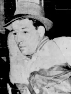 Black-and-white photograph of Art Somers wearing a hat and coat, looking slightly to the side