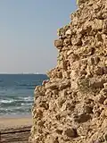 Eroded northern tower of the Sea Gate (or western gate)