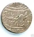 A silver ashrafi issued by Asaf-ud-Daula from the Najibabad mint in AH 1211 (1796/7), regnal year 38