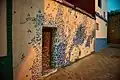Mural featuring Arabic calligraphy