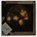 Wraggle, C. Depicts clusters of stars and nebulae.