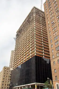 685 First Avenue under construction in May 2017. The facade panels on the lower floors have been installed, while the upper stories' concrete frame is still exposed.