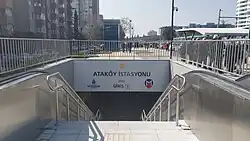Entrance 1 of the M9 station, with the Marmaray platforms visible on the right
