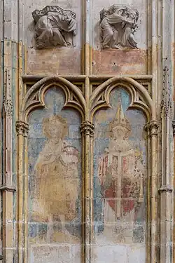 Traces of colored wall paintings; John the Baptist (left) and a Bishop