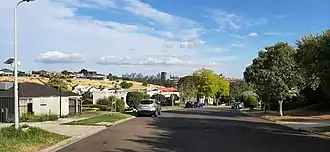 Residential area near the Maribyrnong River with Melbourne CBD in the distance